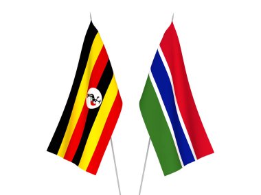 Beyaz arka planda Uganda ve Gambiya Cumhuriyeti 'nin ulusal kumaş bayrakları izole edildi. 3d resimleme.