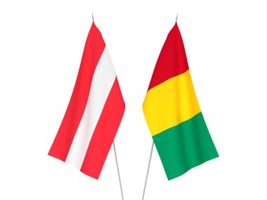 Beyaz arka planda Gine ve Avusturya 'nın ulusal kumaş bayrakları izole edildi. 3d resimleme.