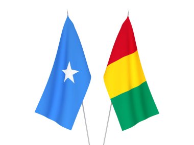 Beyaz arka planda Somali ve Gine 'nin ulusal kumaş bayrakları izole edildi. 3d resimleme.