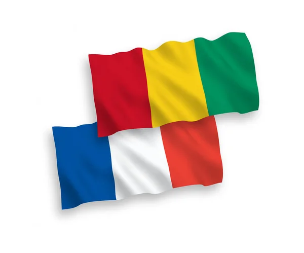 Nationell Vektor Tyg Våg Flaggor Frankrike Och Guinea Isolerad Vit — Stock vektor