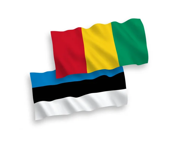 Nationell Vektor Tyg Våg Flaggor Estland Och Guinea Isolerad Vit — Stock vektor