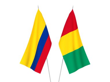 Beyaz arka planda Kolombiya ve Gine 'nin ulusal kumaş bayrakları izole edildi. 3d resimleme.