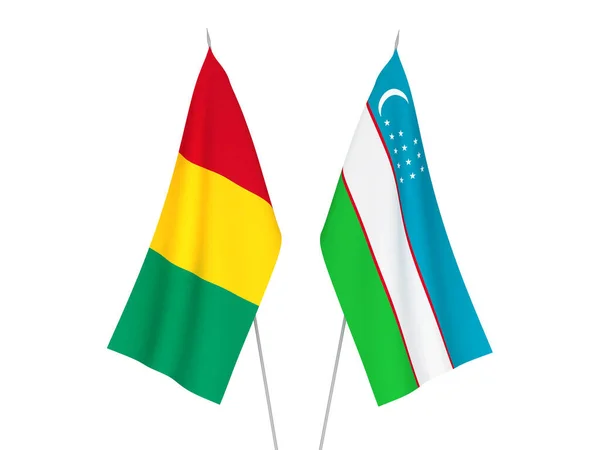 Bandeiras Tecido Nacional Uzbequistão Guiné Isoladas Fundo Branco Ilustração Renderização — Fotografia de Stock