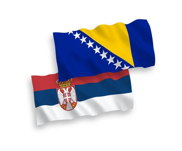 波斯尼亚和黑塞哥维那以及塞尔维亚的国家矢量波纹旗帜在白色背景下被隔离 1比2的比例 — 图库矢量图片