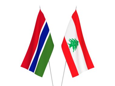 Beyaz arka planda, Gambiya Cumhuriyeti ve Lübnan 'ın ulusal kumaş bayrakları izole edildi. 3d resimleme.