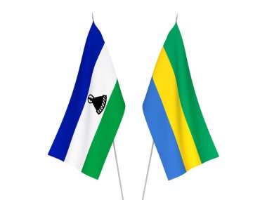 Gabon ve Lesotho 'nun ulusal kumaş bayrakları beyaz arka planda izole edildi. 3d resimleme.