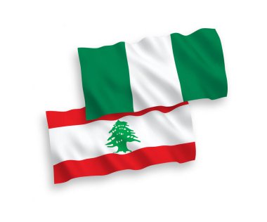 Beyaz arka planda Lübnan ve Nijerya 'nın ulusal taşıyıcı kumaş bayrakları izole edildi. 1 'e 2 oranında.