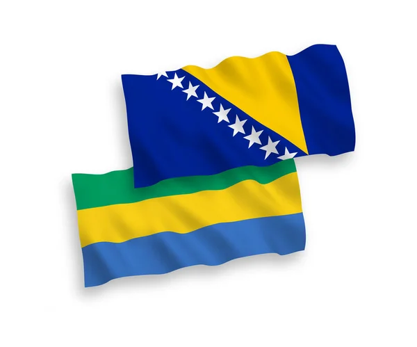 波斯尼亚和黑塞哥维那及加蓬的国家矢量织物波条旗在白色背景下隔离 1比2的比例 — 图库矢量图片