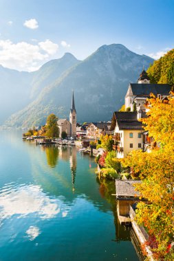 Famous Hallstatt village in Alps mountains, Austria. Beautiful autumn landscape clipart