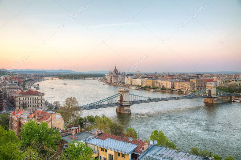 Overview of Budapest with Szechenyi Chain Bridge at sunset