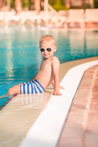 Cute Little Boy Sunglasses Sitting Pool Edge — Stock Photo, Image