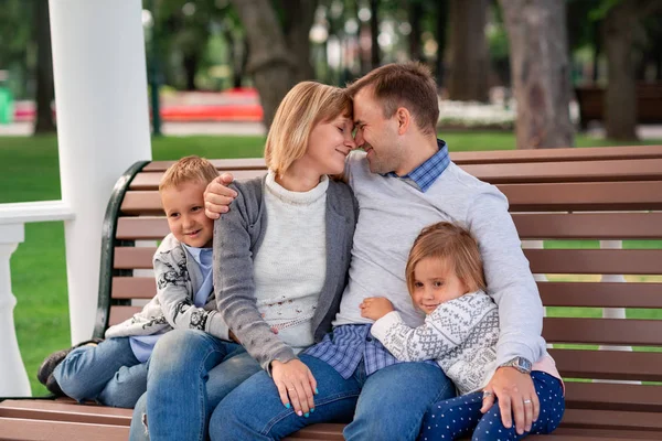 Happy family having fun together in the park outdoor — Stock Photo, Image