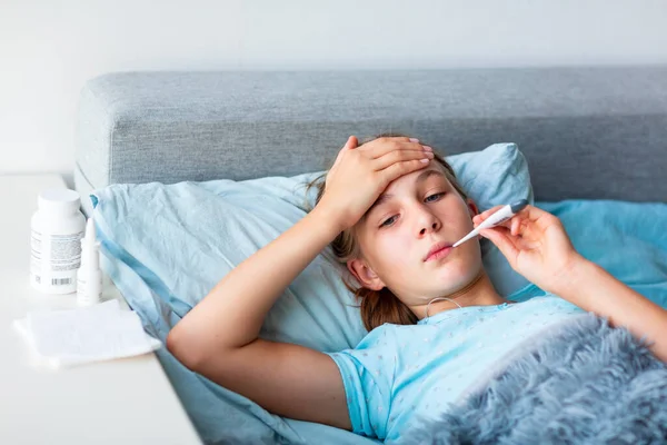 Sick Teenage Little Girl High Fever Headache Laying Bed Holding — Stock Photo, Image