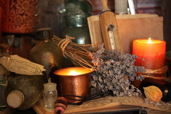 Magic Ritual. Antique Magic Book. Witchcraft and candle background.