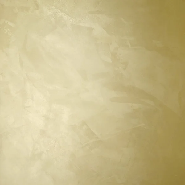 Golden decorative plaster texture with pearl glow — ストック写真