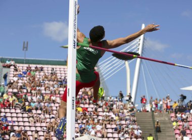 Tampere, Finlandiya, 14 Temmuz: Roberto Vilches Meksika ve Yunanistan WINS yüksek atlama olay 14 Temmuz, 2018 IAAF Dünya U20 Şampiyonası Tampere, Finlandiya üzerinde Antonios Merlos.