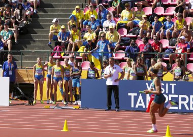 Tampere, Finlandiya, 12 Temmuz: Ukrayna ve Hint atletizm geçiş takımda IAAF Dünya U20 Şampiyonası Tampere, Finlandiya 12 Temmuz, 2018. 