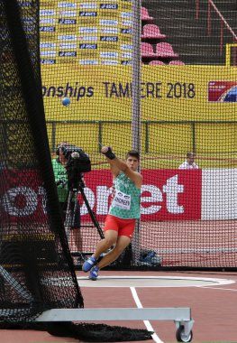 Tampere, Finlandiya, 11 Temmuz: Valentin Andreev Bulgaristan üzerinde çekiç atma olayı IAAF Dünya U20 Şampiyonası Tampere, Finlandiya 11 Temmuz, 2018.