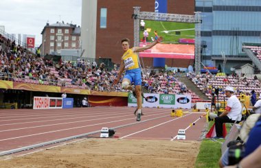 Tampere, Finlandiya, 11 Temmuz: Andriy Avramenko üzerinde 11 Temmuz 2018 uzun atlama olayda Tampere, Finlandiya için IAAF Dünya U20 şampiyonasında Ukrayna.