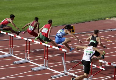 TAMPERE, FINLAND, July 11: Athletes running 110 metres hurdles Heats on the IAAF World U20 Championship in Tampere, Finland 11th July, 2018. clipart