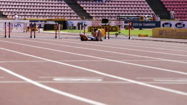 TAMPERE, FINLAND, July 11: PIIBE KIRKE ALJAS (ESTONIA) on the 400 metrs hurdles in IAAF World U20 Championship in Tampere, Finland 11 July, 2018 clipart