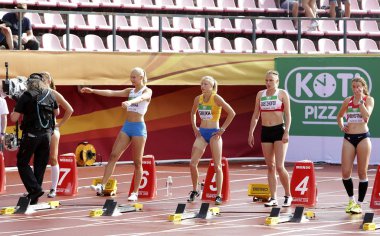 Tampere, Finlandiya, 12 Temmuz: Sanni Pajasmaa (Fin), Alina Shukh (Ukrayna), Andrea Obetzhofer (Aut), Jana Novotna (Cze) Tampere, Finlandiya'da düzenlenen Iaaf Dünya U20 Şampiyonası'nın başlangıcında 12 Temmuz 2018