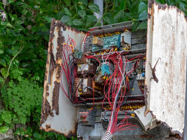 Chaotic Open Rusty Wiring Box — Stock Photo, Image