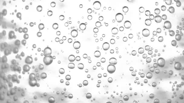 Водяные пузыри поднимаются и взрываются — стоковое видео