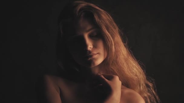 Portrait of sensual woman on black background — Stock Video