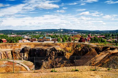 Mining Area of the Great Copper Mountain in Falun, Sweden - UNESCO World Heritage Site. The are an outstanding example of a technological ensemble with a historical industrial landscape. clipart
