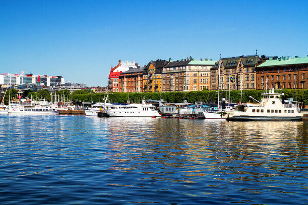 STOCKHOLM - JUNE 16: Panorama of Kungsholmen island on June 16, 2011 in Stockholm. Kungsholmen island seen from Sodermalm island, across Riddarfjarden channel.