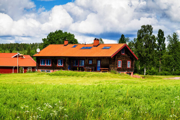 Typical wooden cottage in the countryside, Sweden