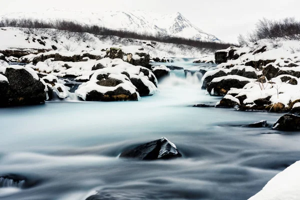 Increíble Vista Cascada Bruarfoss Invierno Agua Azul Fluye Sobre Las —  Fotos de Stock