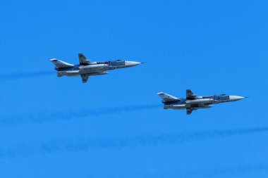 MOSCOW, RUSSIA - MAY 4, 2019: Sukhoi Su-25 jet fighters take part in preparation for Victory Day (Den Pobedy) airshow clipart