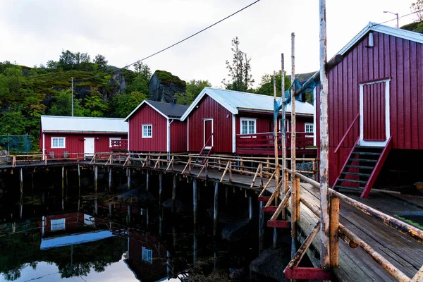 Nusfjord Harbor Colorful Red Fishing Houses Sailing Boat Peaceful Evening — стоковое фото