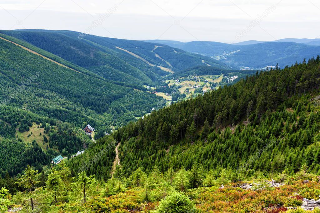 View of hiking trails and Karkonosze (Krkonose) mountains national park at the Poland and Czech Republic border. Scenic summer landscape with beautiful views.