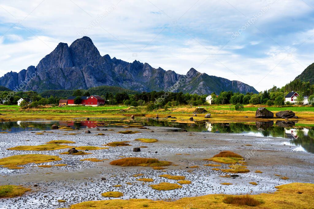 A typical Lofoten bay view. Scene on a lovely idyllic day with. Lofoten Islands are popular tourist destination for people from around the world and still gaining popularity. Norway, Europe