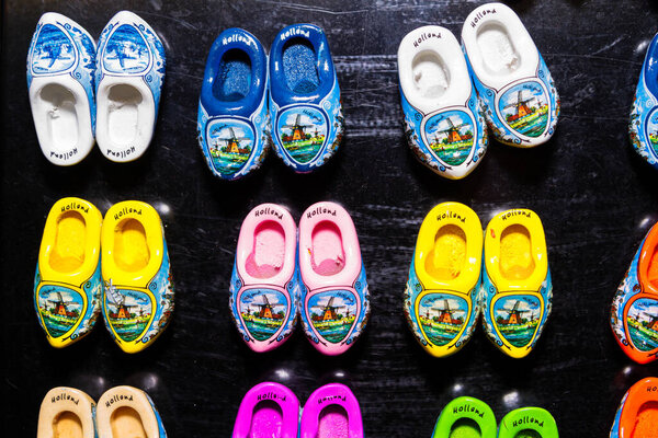 AMSTERDAM, NETHERLANDS - NOVEMBER 08: Clogs for sale at a Dutch retail shop in Amsterdam, Netherlands on November 08, 2014. Wooden shoes are a well know traditional souvenir from Holland