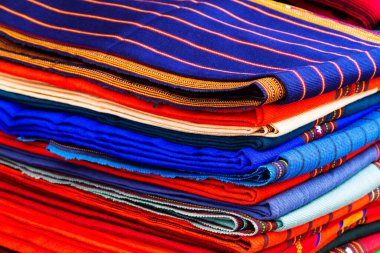 Mayan blankets textile designs on the market in Chichicastenango, Guatemala, Central America clipart
