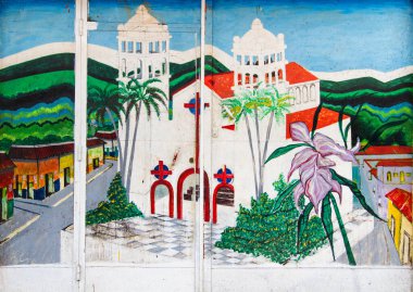 JUAYUA, El SALVADOR - MAY 05:  Mural paintings on a house in Juayua in El Salvador on May 05, 2014. Many houses in El Salvador is decorated in this way. clipart