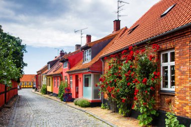 RONNE, DENMARK - JUNE 24: Typical Bornholm architecture in Ronne, Denmark on June 24, 2014. Ronne is the capital of Bornholm island. clipart