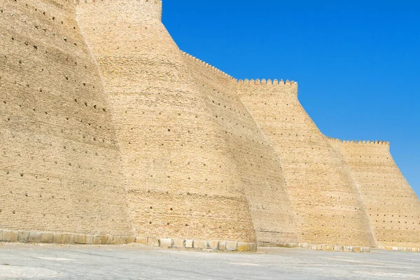 Wall of the Bukhara Fortress - The Ark, Uzbekistan. Central Asia. Located on the Silk Road, the city has long been a center of trade, scholarship, culture, and religion.