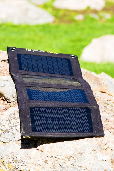 Foldable solar panel in a mountain base camp