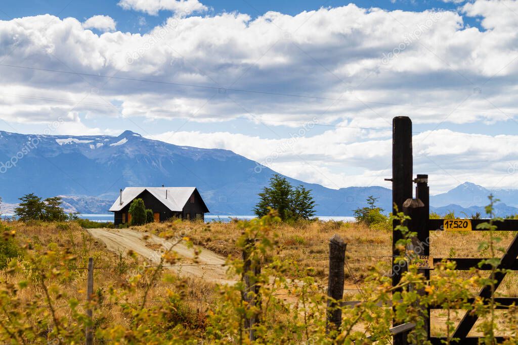 Old weathered wooden building on a farm in Patagonia, Chile