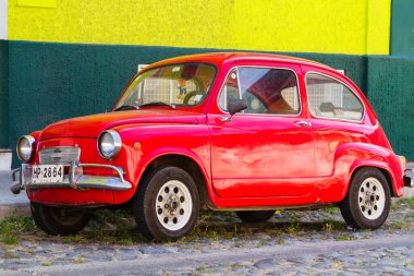 VALPARAISO, CHILE - FEBRUARY 20, 2016: Fiat 500 parked Valparaiso. Fiat 500 was one of the most produced European cars ever with 3,893,294 units manufactured in years 1957-1975. clipart