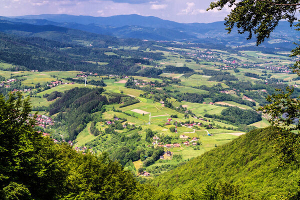 View of Polish town Rytro from Beskidy Mountains (Beskid Sadecki). Beskid Sadecki is a part of Karpaty (Carpathian mountains). Europe