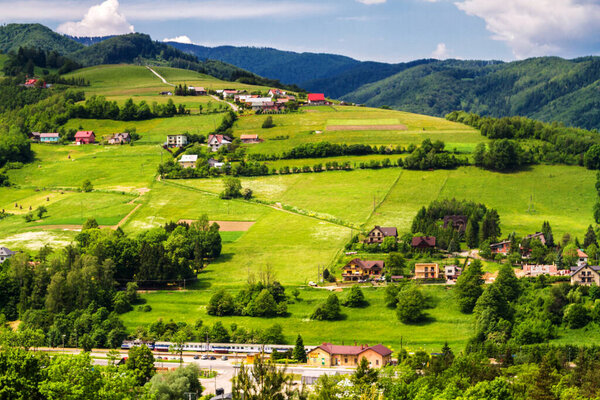 View of Polish town Rytro from Beskidy Mountains (Beskid Sadecki). Beskid Sadecki is a part of Karpaty (Carpathian mountains). Europe