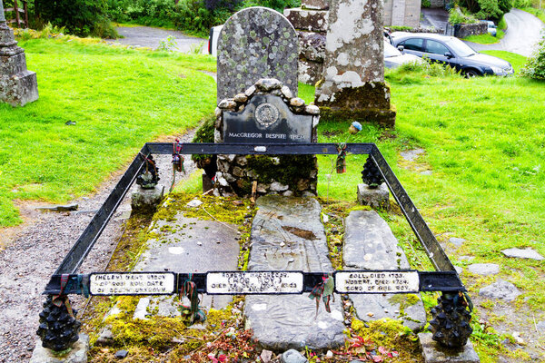 BALQUHIDDER, SCOTLAND - AUGUST 19, 2016: Historic Balquhidder cemetery, the final resting place of the famous Scottish folk hero Rob Roy MacGregor. Scotland, United Kingdom