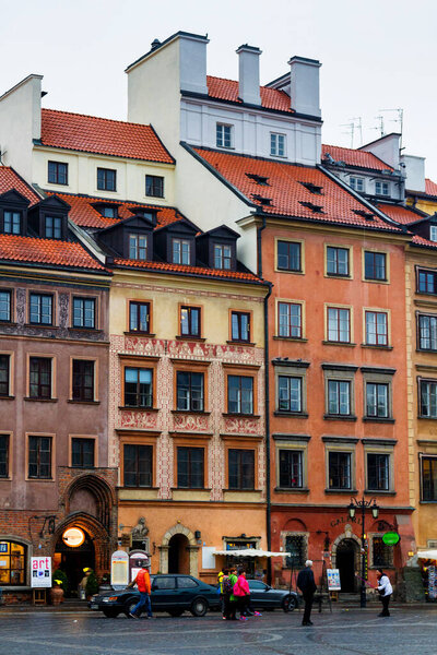WARSAW, POLAND - OCTOBER 19, 2016 ; Beautiful Tenement houses on the street Nowomiejska and street Freta, Old Market Square