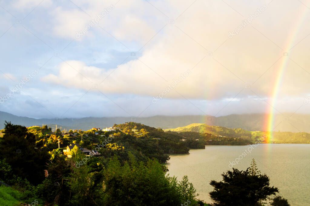 View of the bay on Coromandel Peninsula on a sunny evening, north island, New Zealand